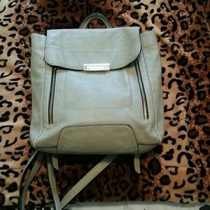 Gray with gold backpack